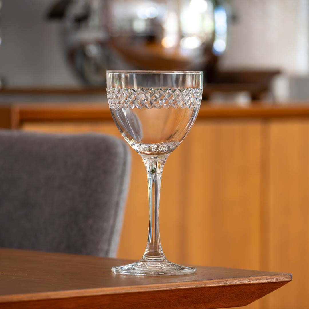 Rolf Glass Diamond 5oz Nic & Nora Classic Cocktail Glass on a dining room table