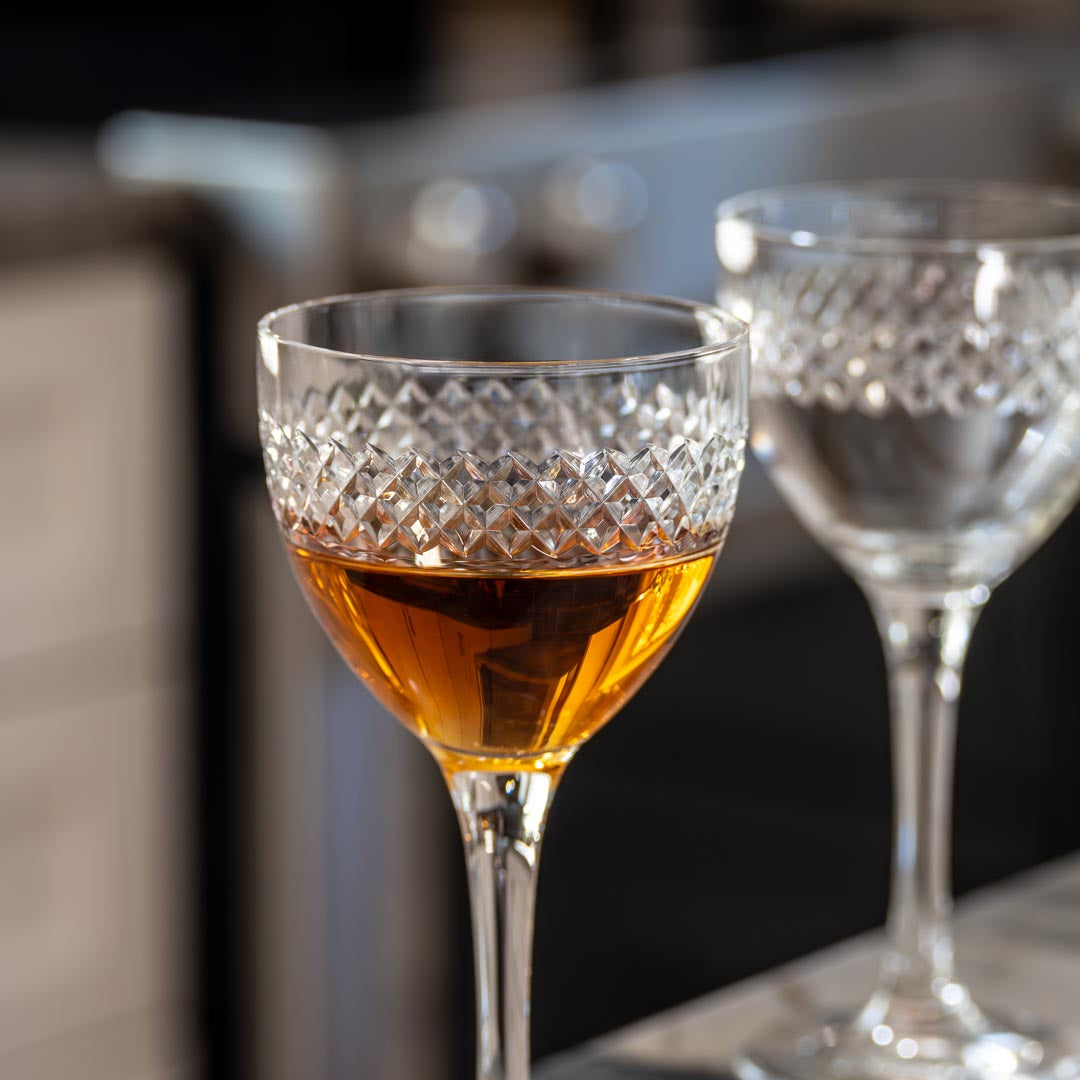 Rolf Glass Diamond 5oz Nic & Nora Classic Cocktail Glass close up with bourbon