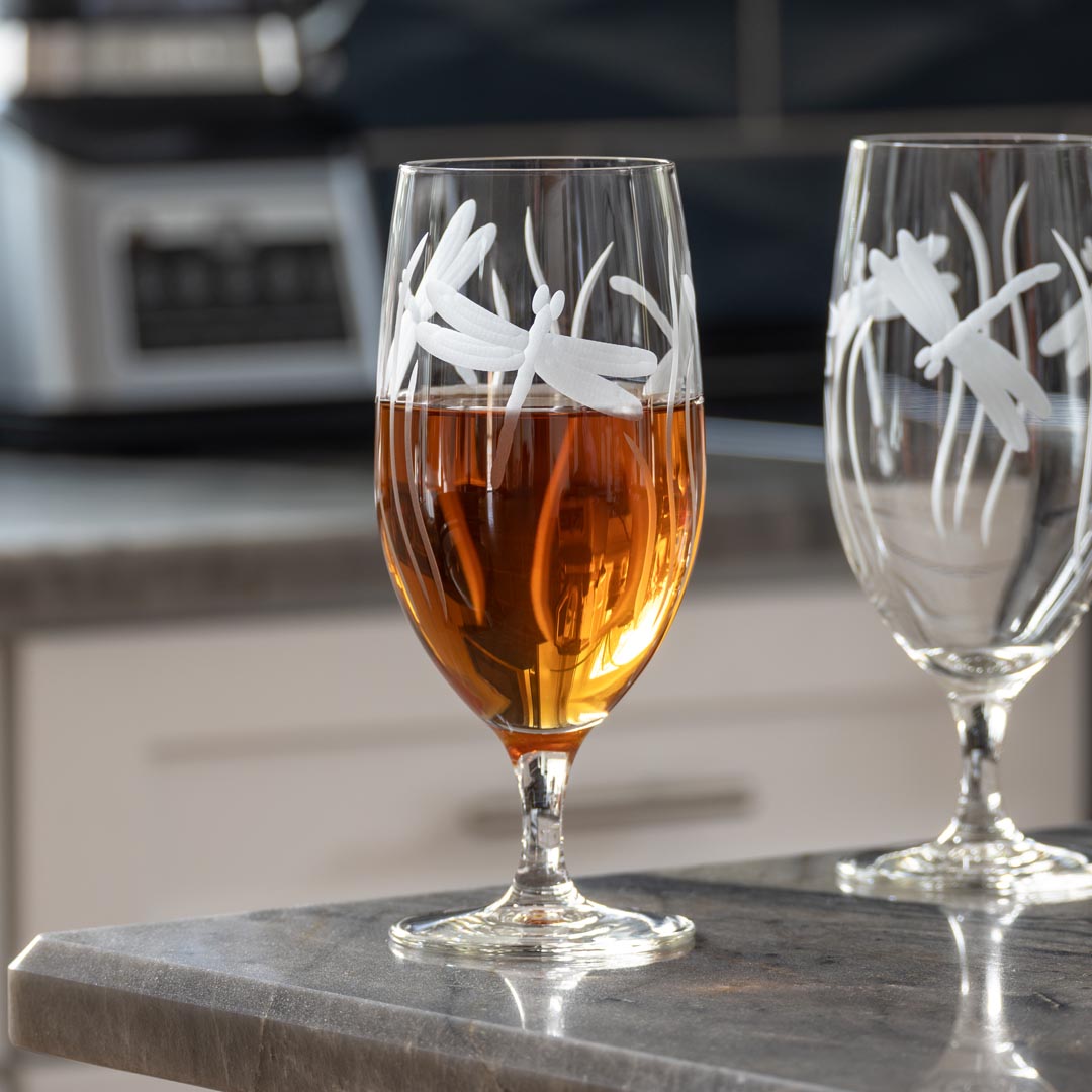 Rolf Glass Dragonfly 16oz Footed Iced Tea Glass full on kitchen counter