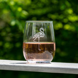 Rolf Glass Flamingo 17oz Stemless Wine Glass outdoor patio and greenery