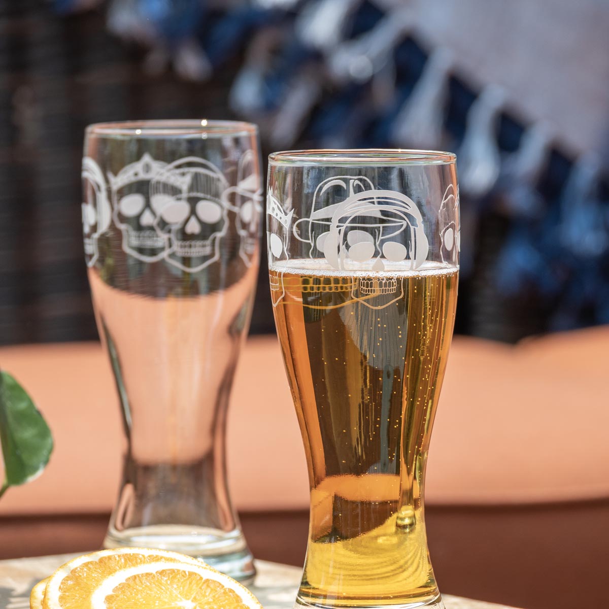 Rolf Glass Numbskulls 20oz Large Beer Pilsner Glass showing detailed engraving of skill with beats headphones on the deck