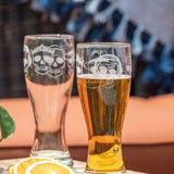 Rolf Glass Numbskulls 20oz Large Beer Pilsner Glass showing detailed engraving of skill with beats headphones on the deck