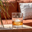 Sailing Double Old Fashioned Glass by Rolf Glass, set on an outdoor patio