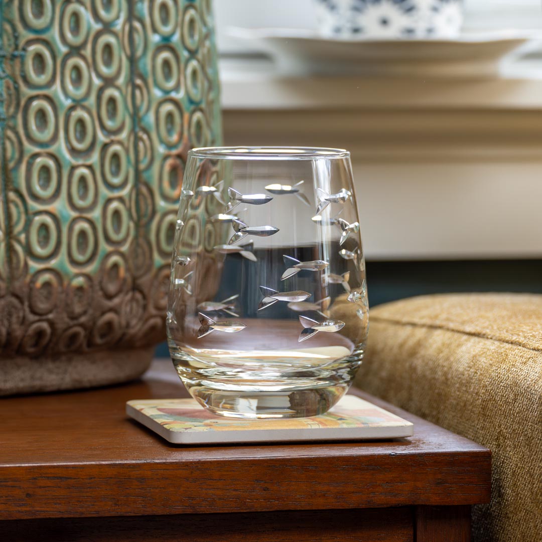 Rolf Glass School of Fish 15oz Clear Stemless Wine Glass in the living room