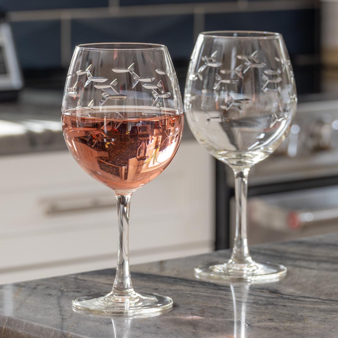 Rolf Glass School of Fish 18oz Balloon Red Wine Glass empty on a granite kitchen counter top
