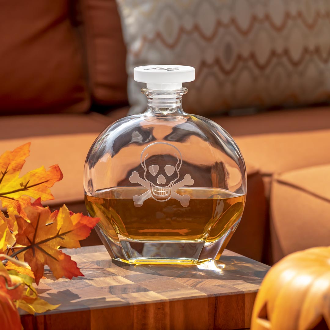 Enjoy some of your favorite spirt from the Rolf Glass Skull and Crossbones 23oz Whiskey Decanter. Sure to be a hit at your next Halloween Party