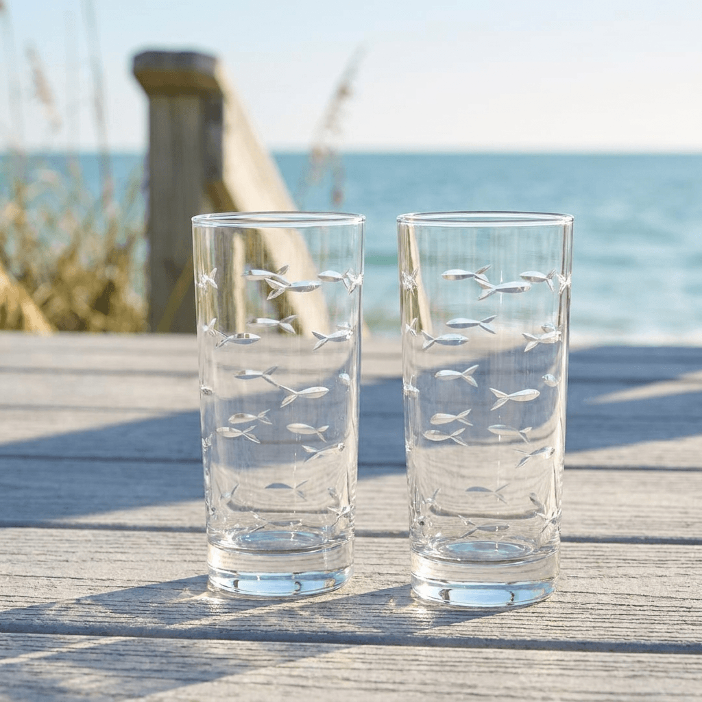 Rolf Glass School of Fish Cooler Glasses Set of 2, lifestyle photo at the beach