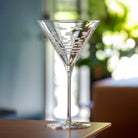 Rolf Glass Strata 10oz Martini Cocktail Glass on a dinner table